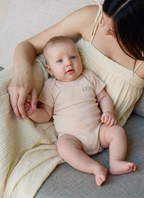 Short Sleeve Organic Baby Bodysuit lifestyle  |  Powder Rose